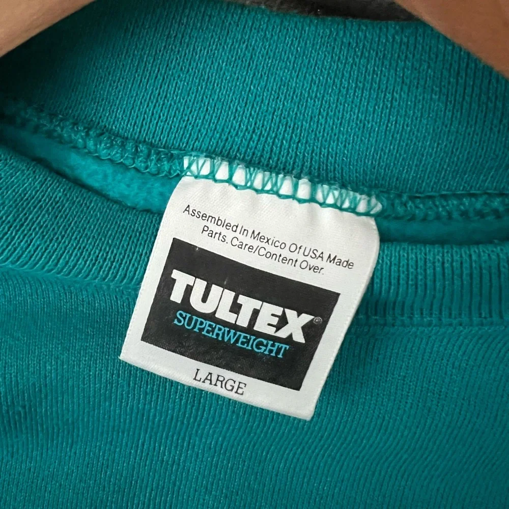 Vintage Tultex Disney Universal Studios Teal Crewneck Sweater